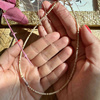 ręcznie robiony choker nude z naturalnych kamieni rzecznych z pałeczką jaspis, złote hemetyty